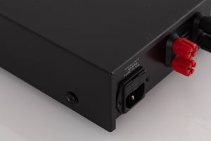 Rear right corner of a used Audiolab 8000P Power Amplifier in a Black finish