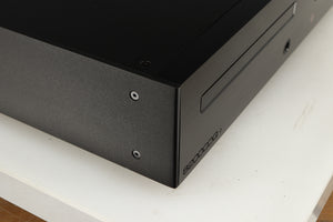 Close up of a used Audiolab 8200CDQ CD Player in a black finish showing very minor scratching on left side 