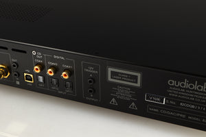 Close up of a used Audiolab 8200CDQ CD Player in a black finish showing very minor scratching on rear