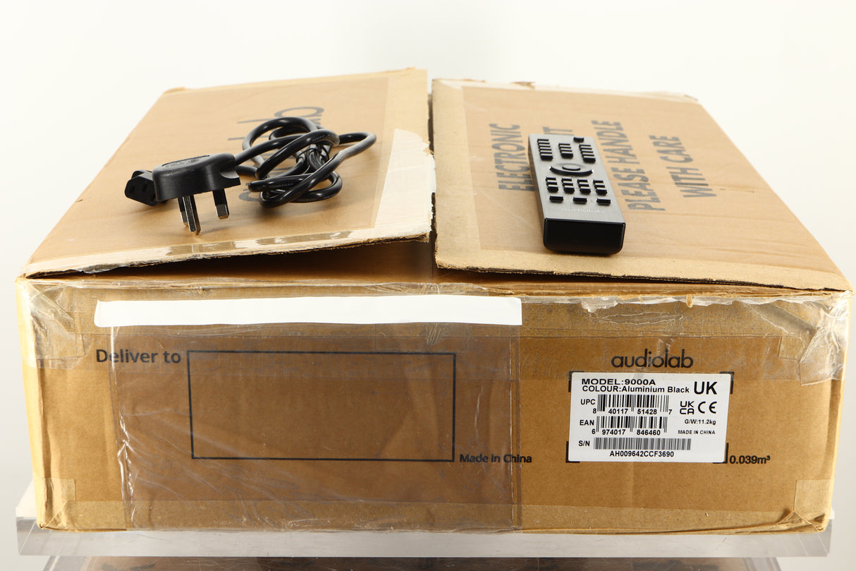 Box of a used Audiolab 9000A Integrated Amplifier in Black finish with mains cable and remote