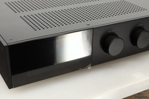 Close up view of a used Audiolab 9000A Integrated Amplifier in Black
