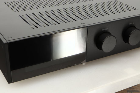 Close up view of a used Audiolab 9000A Integrated Amplifier in Black