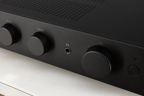 Close up of a used Audiolab 9000A Integrated Amplifier in a black finish showing some of the fascia