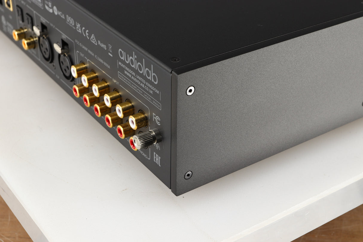 Rear left corner of a used Audiolab 9000A Integrated Amplifier in a black finish