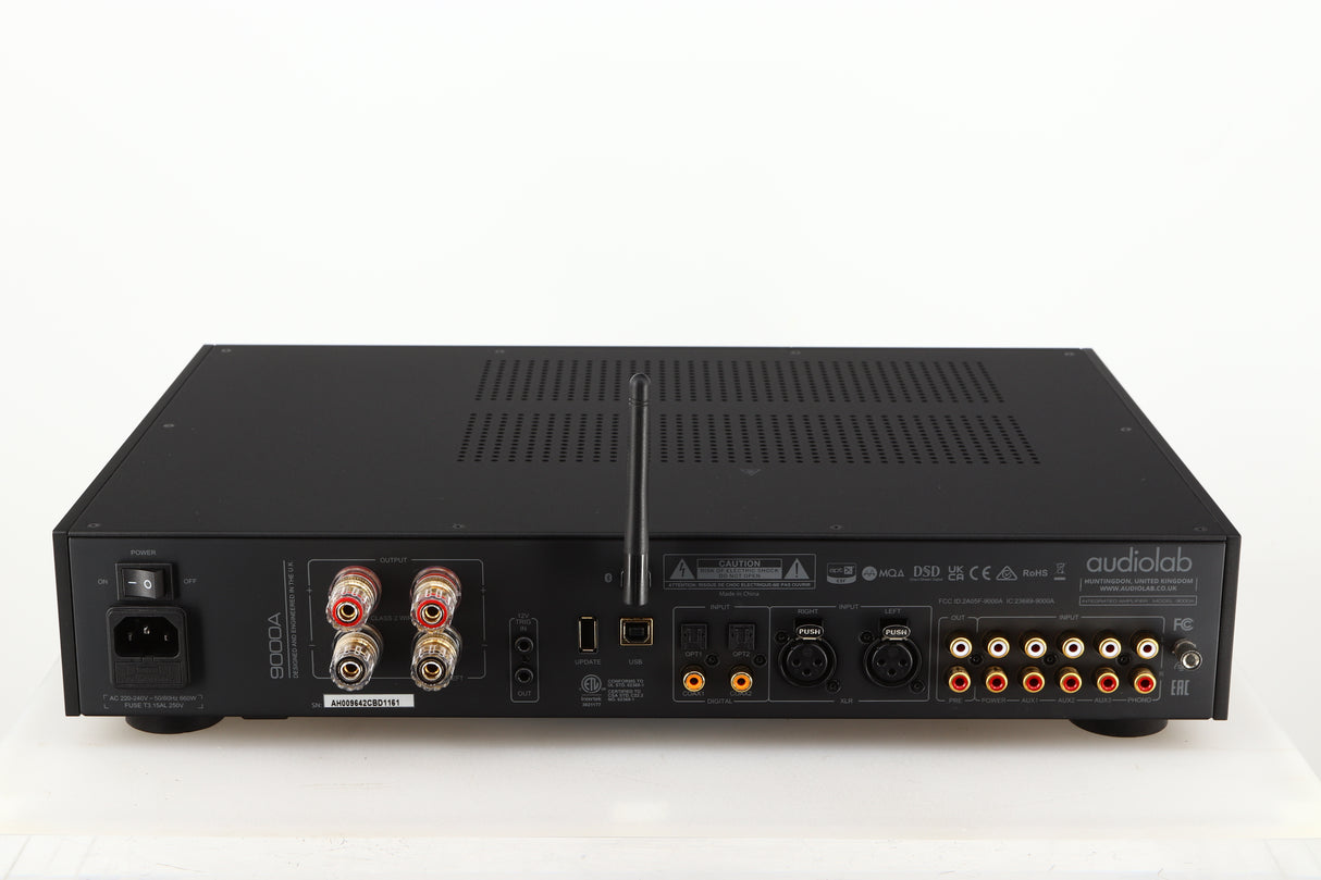 Rear view of a used Audiolab 9000A Integrated Amplifier in a black finish showing Phono Inputs and Outputs, Mains Input, Speaker Output and Optical Input