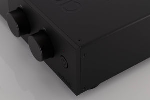 Front right corner of a used Audiolab D9 Digital Analogue Converter in a Black finish