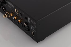 Rear left corner of a used Audiolab D9 Digital Analogue Converter in a Black finish
