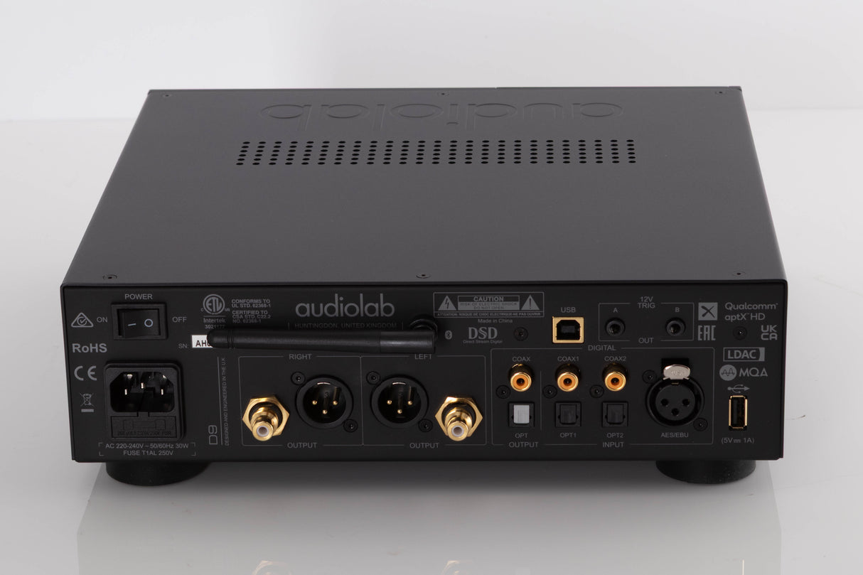 Rear view of a used Audiolab D9 Digital Analogue Converter in a Black finish showing USB Input, Mains Input, Phono Inputs, Phono Output, Optical Inputs and Optical Output