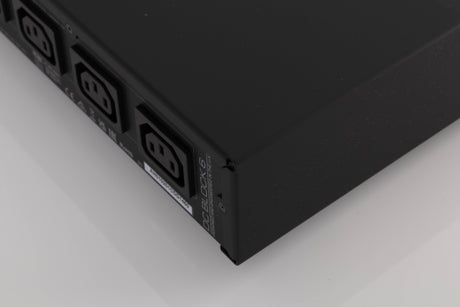 Rear left corner of a used Audiolab DC Block 6 in a Black finish