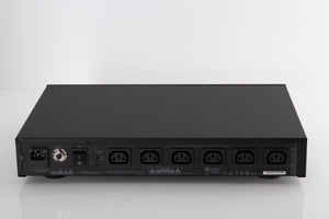Rear view of a used Audiolab DC Block 6 in a Black finish showing Mains Input and Power Outputs