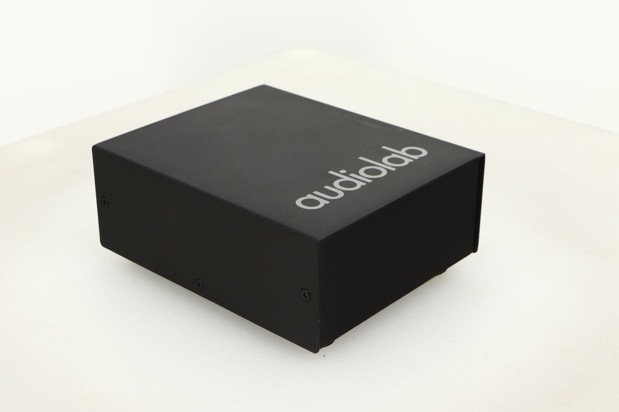Front left corner view of a used Audiolab DC Block Mains Filter in Black finish