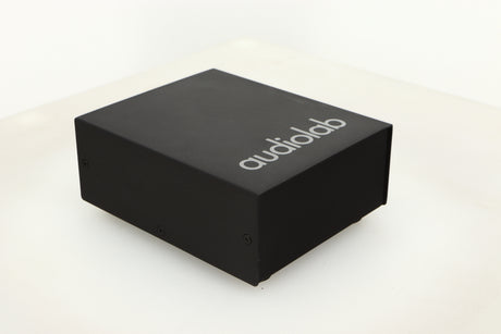 Front left corner view of a used Audiolab DC Block Mains Filter in Black finish