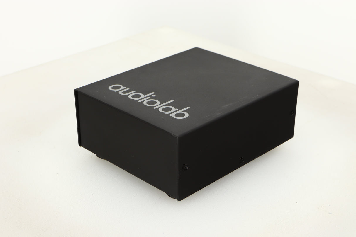 Front right corner view of a used Audiolab DC Block Mains Filter in Black finish