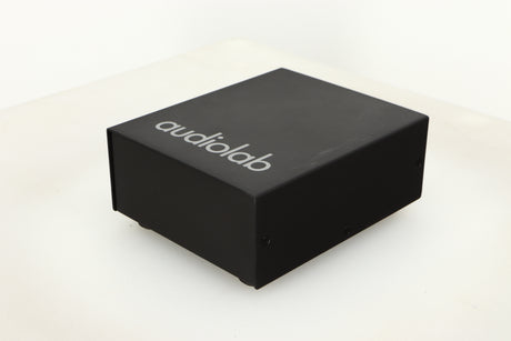 Front right corner view of a used Audiolab DC Block Mains Filter in Black finish