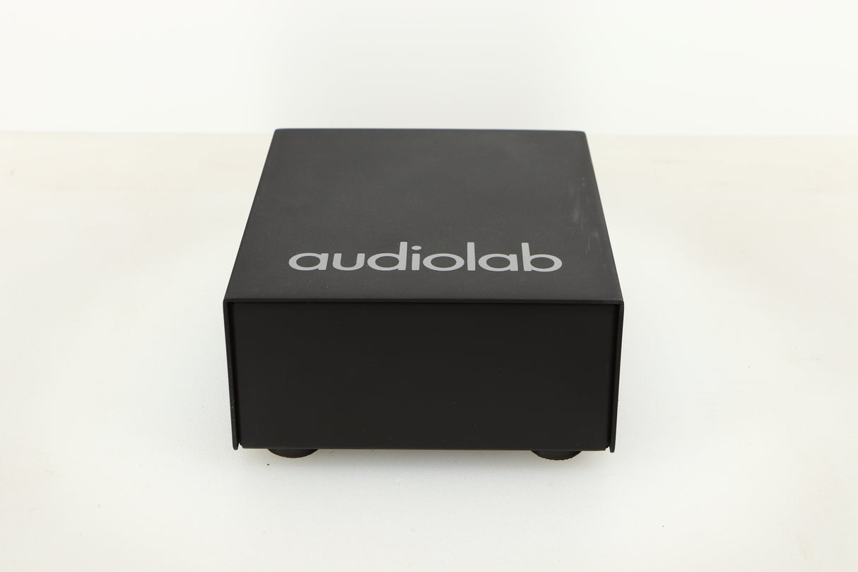 Front view of a used Audiolab DC Block Mains Filter in Black finish