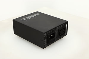 Rear left corner view of a used Audiolab DC Block Mains Filter in Black finish