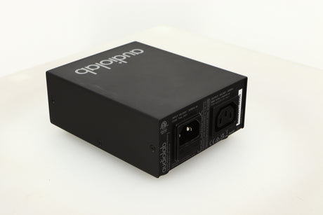 Rear left corner view of a used Audiolab DC Block Mains Filter in Black finish