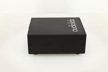 Side view of a used Audiolab DC Block Mains Filter in Black finish