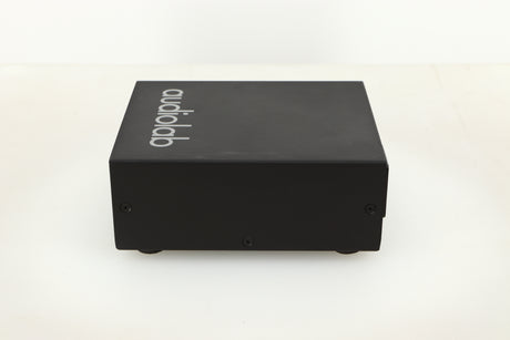 Side view of a used Audiolab DC Block Mains Filter in Black finish