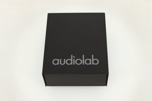Top view of a used Audiolab DC Block Mains Filter in Black finish