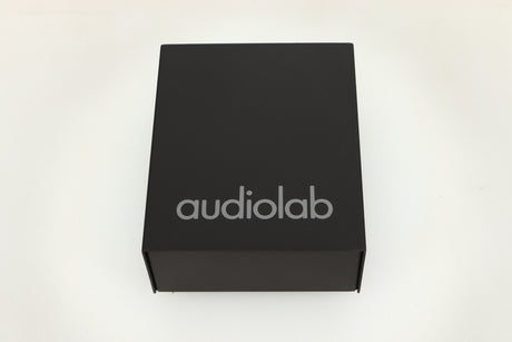 Top view of a used Audiolab DC Block Mains Filter in Black finish