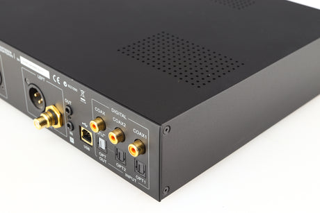 Rear left corner of a used Audiolab M-DAC Digital Analogue Converter in a black finish