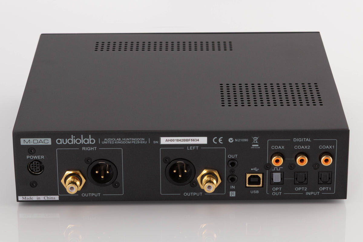 Rear view of a used Audiolab M-DAC Digital Analogue Converter in a Black finish showing Power Input, Optical Inputs, Optical Output, Coaxial Inputs, USB Input and XLR Outputs