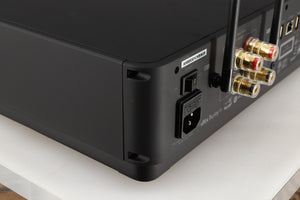 Rear right corner of a used Audiolab Omnia Digital Integrated System in a black finish