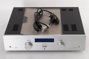 Top of a used Audionet SAM Integrated Amplifier in a Silver finish showing Mains Cable and Manual
