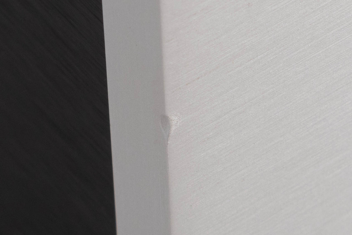 Close up of a used Audionet SAM Integrated Amplifier in a Silver finish showing small nick on front left corner 
