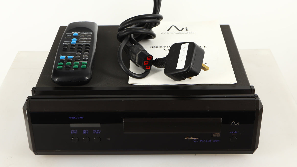 Top of a used AVI Laboratories S2000MC CD Player showing Remote, Mains Cable, Manual and Batteries