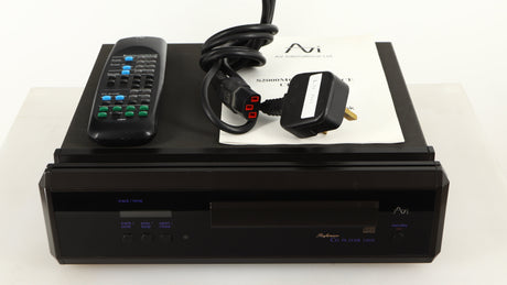 Top of a used AVI Laboratories S2000MC CD Player showing Remote, Mains Cable, Manual and Batteries