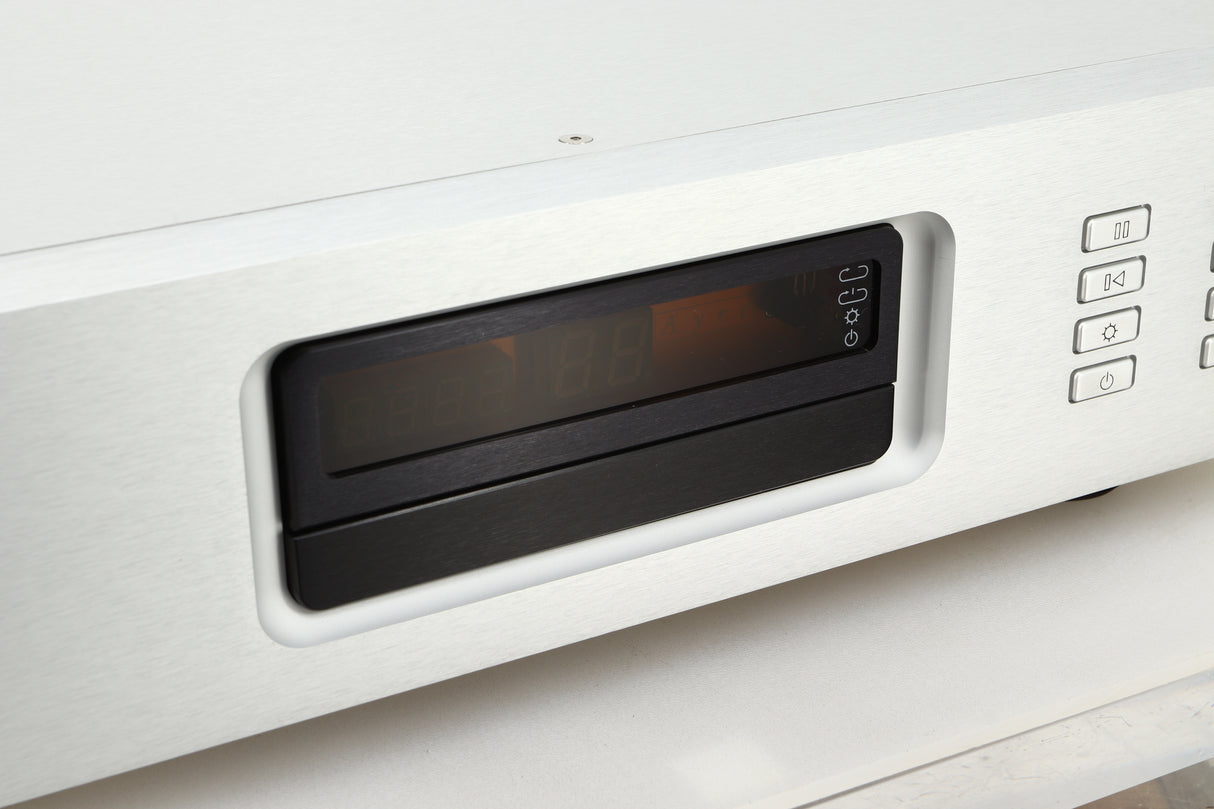 Close up view of a used Ayre CX-7 CD Player in silver finish showing the display