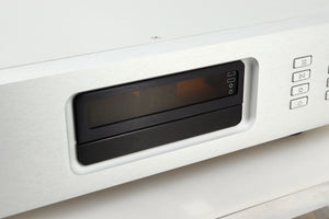 Close up view of a used Ayre CX-7 CD Player in silver finish showing the display