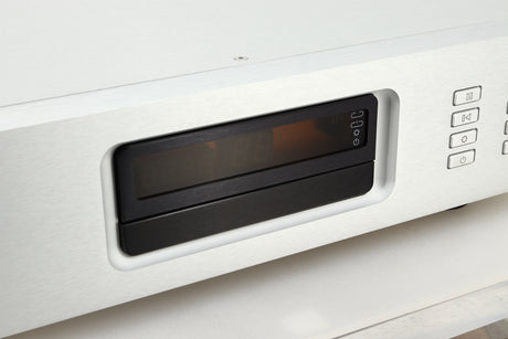 Close up view of a used Ayre CX-7 CD Player in silver finish showing the display