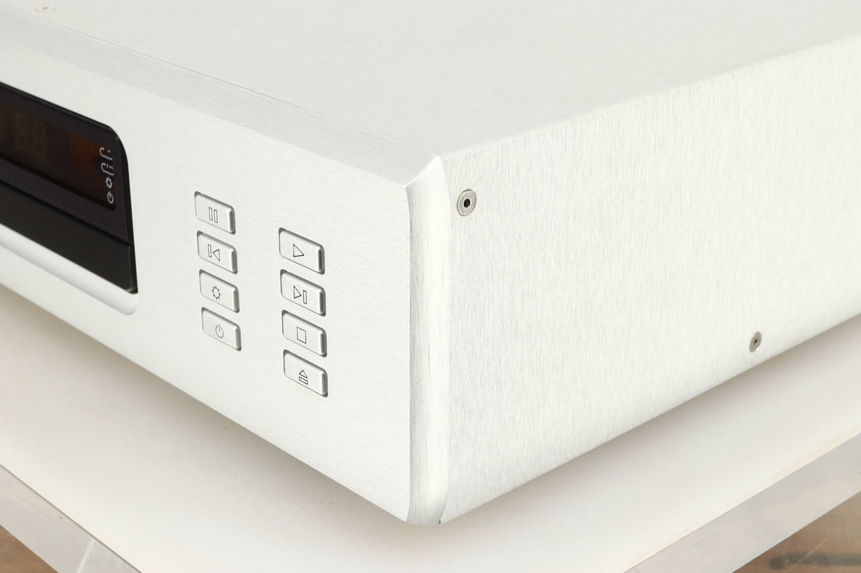 Front right corner view of a used Ayre CX-7 CD Player in silver finish 