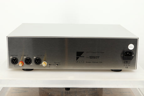 Rear view of a used Ayre CX-7 CD Player in silver finish showing mains input, XLR and RCA outputs