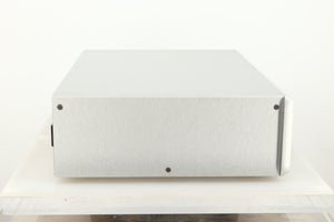 Side view of a used Ayre CX-7 CD Player in silver finish 