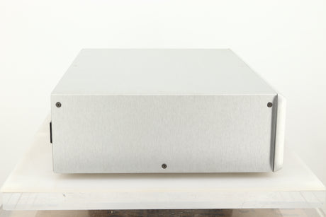 Side view of a used Ayre CX-7 CD Player in silver finish 