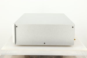Side view of a used Ayre CX-7 CD Player in silver finish 