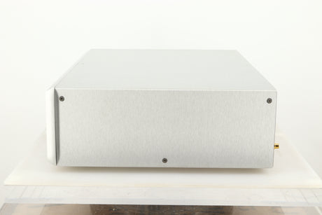 Side view of a used Ayre CX-7 CD Player in silver finish 