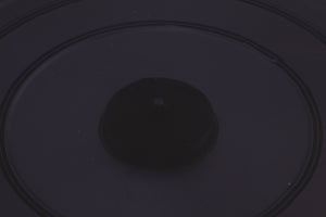 Close up of a used B&O Beogram RX2 Turntable showing some damage on lid
