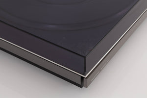 Front left corner of a used B&O Beogram RX2 Turntable