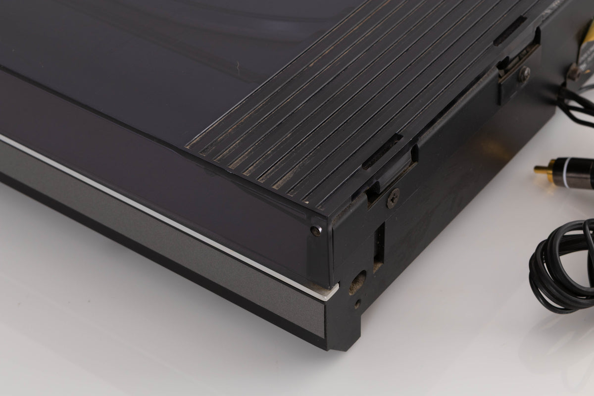 Rear right corner of a used B&O Beogram RX2 Turntable
