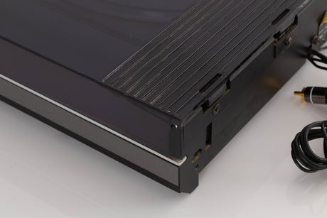 Rear right corner of a used B&O Beogram RX2 Turntable