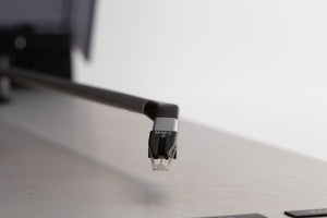Close up of a used B&O Beogram RX2 Turntable showing stylus