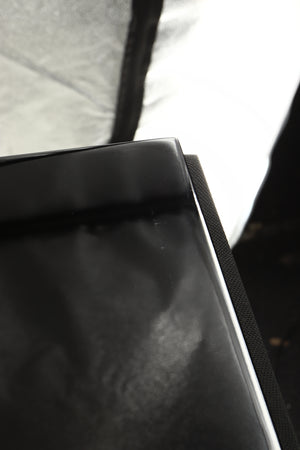 Close up view of a used B&W 704 S2 Floorstanding Speakers in Gloss Black showing marks on the top front edge 