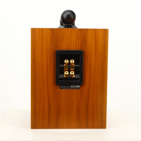 Rear view of a used B&W 805 Matrix Standmount Speaker in a cherry finish