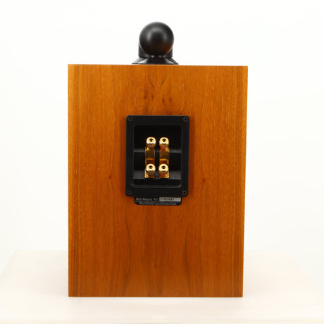 Rear view of a used B&W 805 Matrix Standmount Speaker in a cherry finish