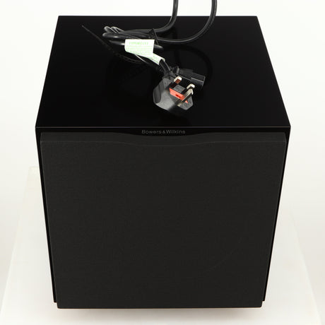 Top of a used B&W ASW10CM Subwoofer in a gloss black finish showing Mains Cable